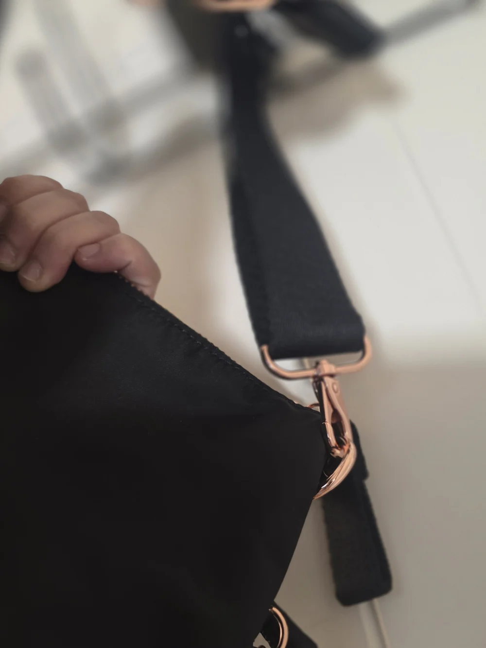 Kipling Black Crossbody with Rose Gold Hardware and Tan Tassel